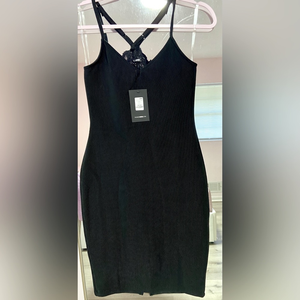 Cute and sexy midi dress with lace back and slit. Brand new Fashion Nova